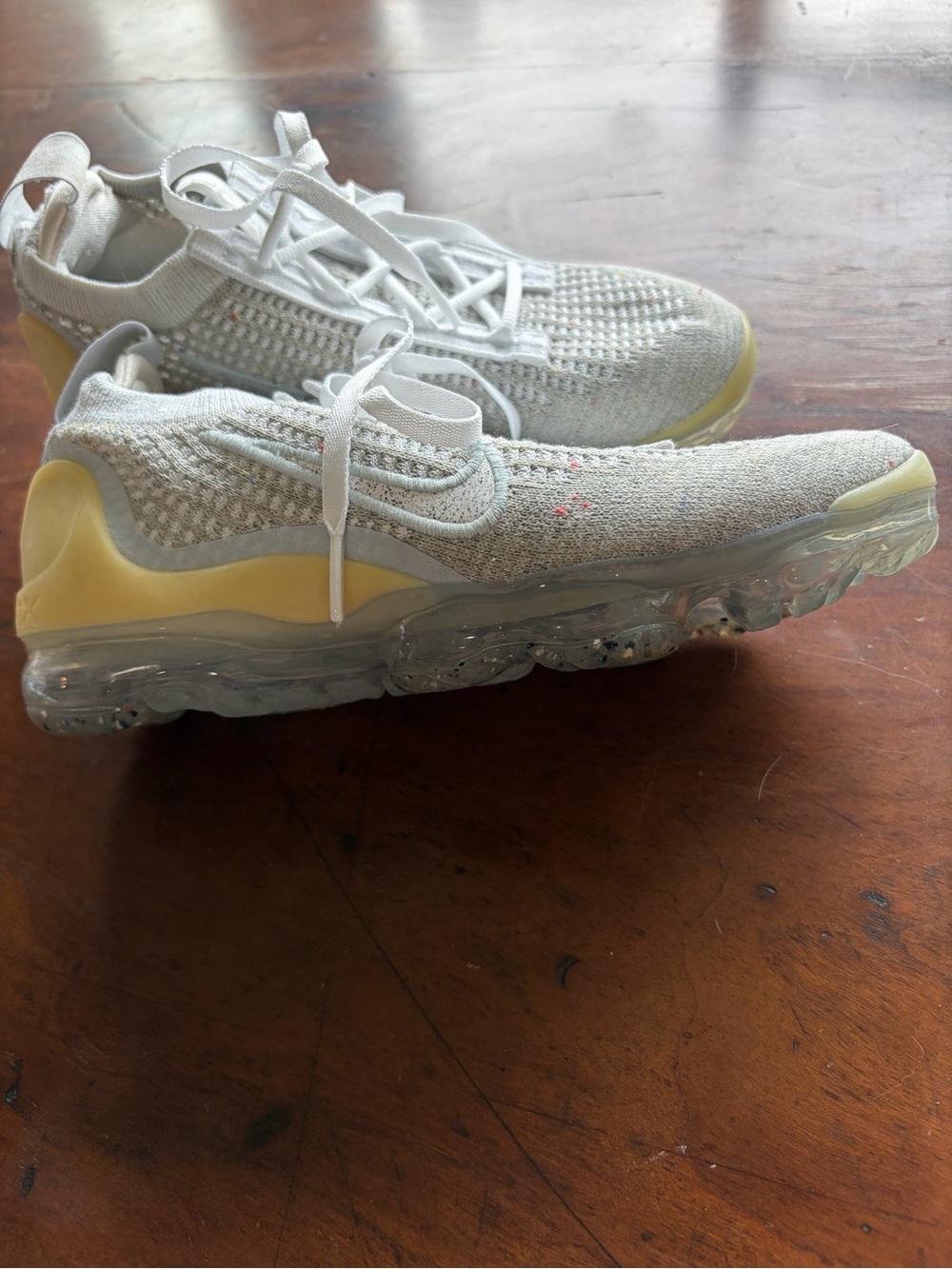 Nike Women's Knit Slip-On Sneakers in White and Pale Yellow